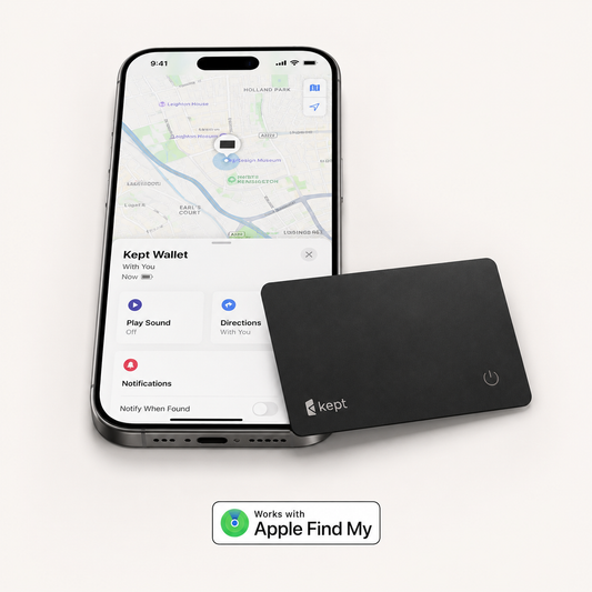 A black rectangular electronic tracker device labeled 'kept' is shown resting against a smartphone on a light background. The phone screen displays a map and the 'Kept Wallet' app, and a badge at the bottom reads 'Works with Apple Find My'.